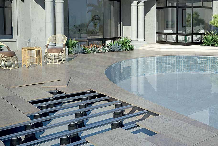 Ground level pedestal system installation around swimming pool area